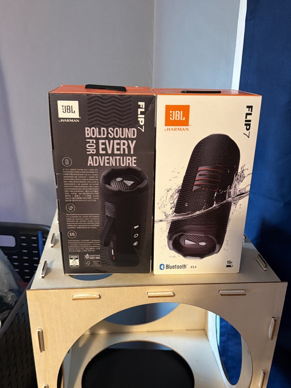 JBL Flip 7 Portable Bluetooth Speaker - Black with Orange Accents